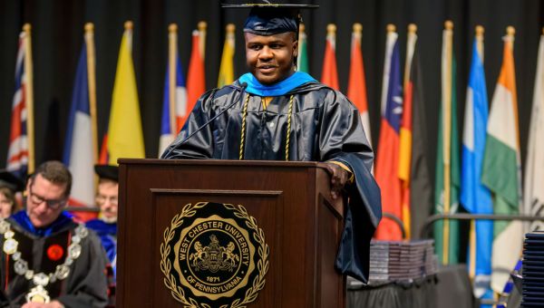 Student speaking at commencement