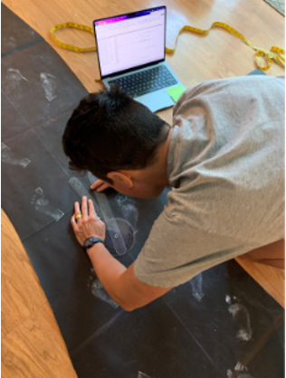 Dr. Foster tracing in chalk