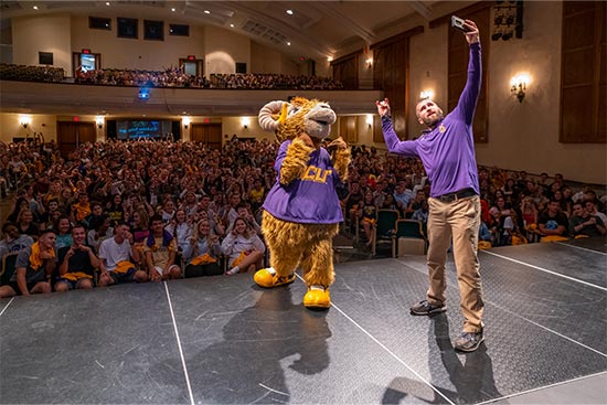 Rammy on stage at orientation