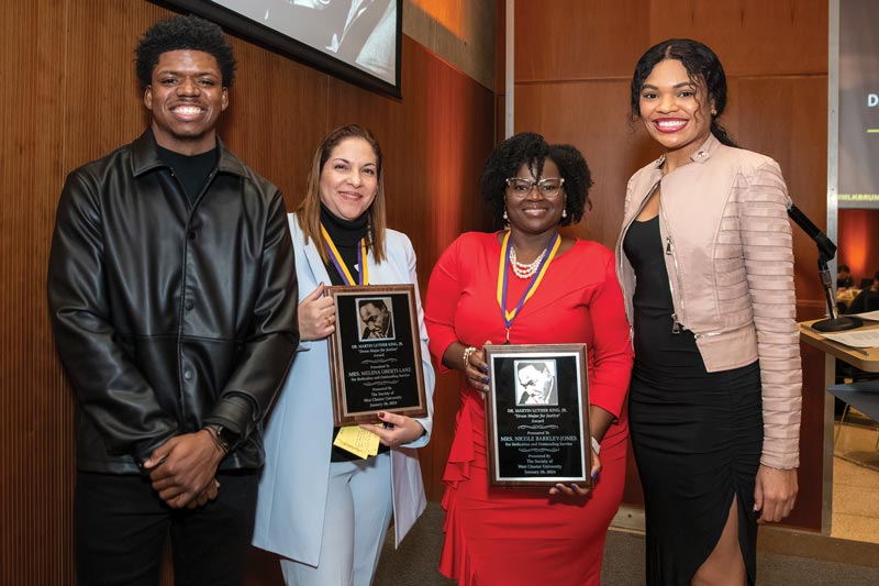 Left to right MLK Brunch student co-host Josef Sanders, Drum Major for Justice Milena Oberti Lanz M’13, Drum Major for Justice Nicole Barkley-Jones ’99, and MLK Brunch student co-host Journey Washington.