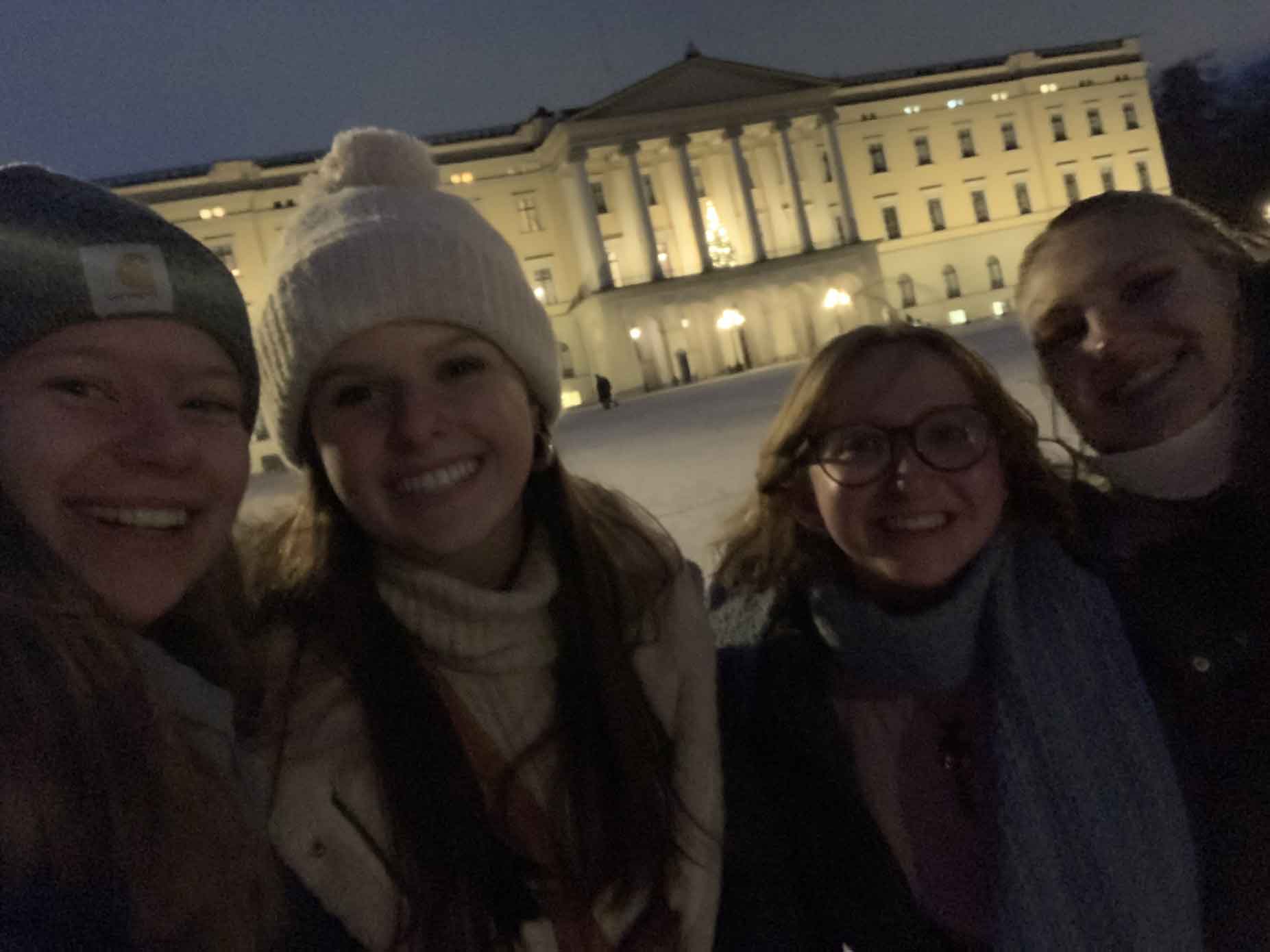 Group smiling in the snow