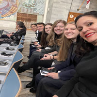 group selfie down a row of chairs