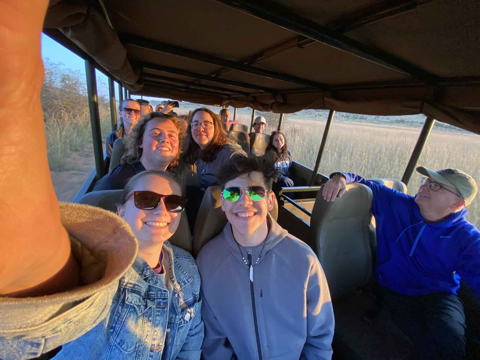 Group selfie in caravan