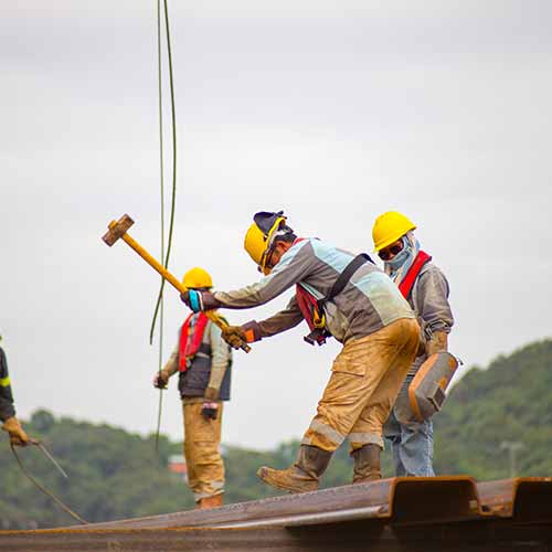 Workers with hammer