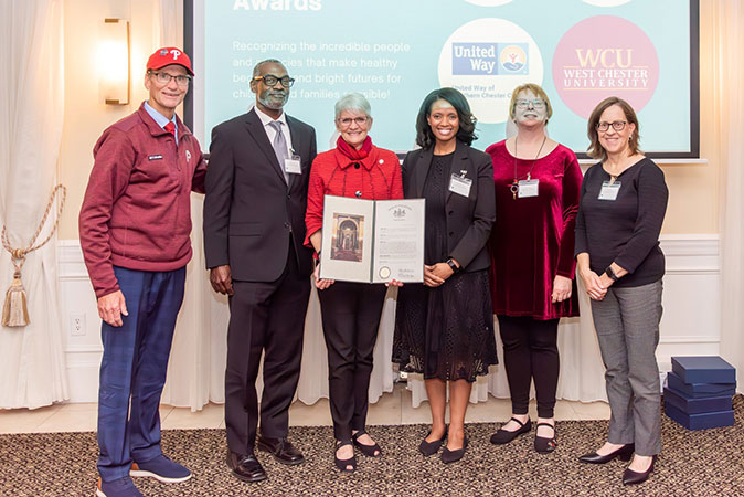 Senator John I. Kane, Michael Burns, PhD (Associate Professor and Department Chair, English), Senator Carolyn T. Comitta, Chiwoneso Beverley Tinago, PhD, MPH, CHES® (Associate Professor and Internship Coordinator, Bachelor of Science in Public Health Program), Sharon DeJoy, PhD, MPH, CPH (Associate Professor and Program Director, Bachelor of Science in Public Health Program) , Janet Bradley, MSS, MLSP, LCSW (Director of Field Education, Undergraduate Social Work Program)