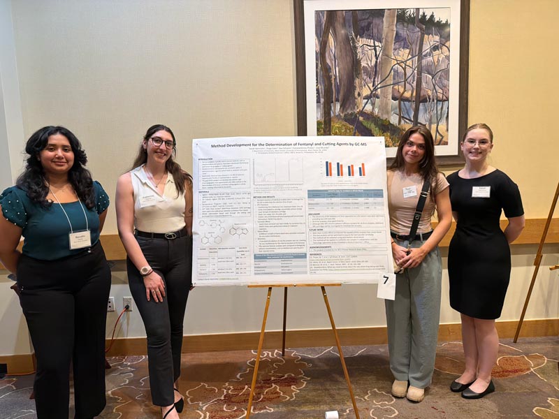 Revathi Variar, Heinrichs Sarah, Katherine Hayner, and Paige Ickes presenting their work at the CFDV