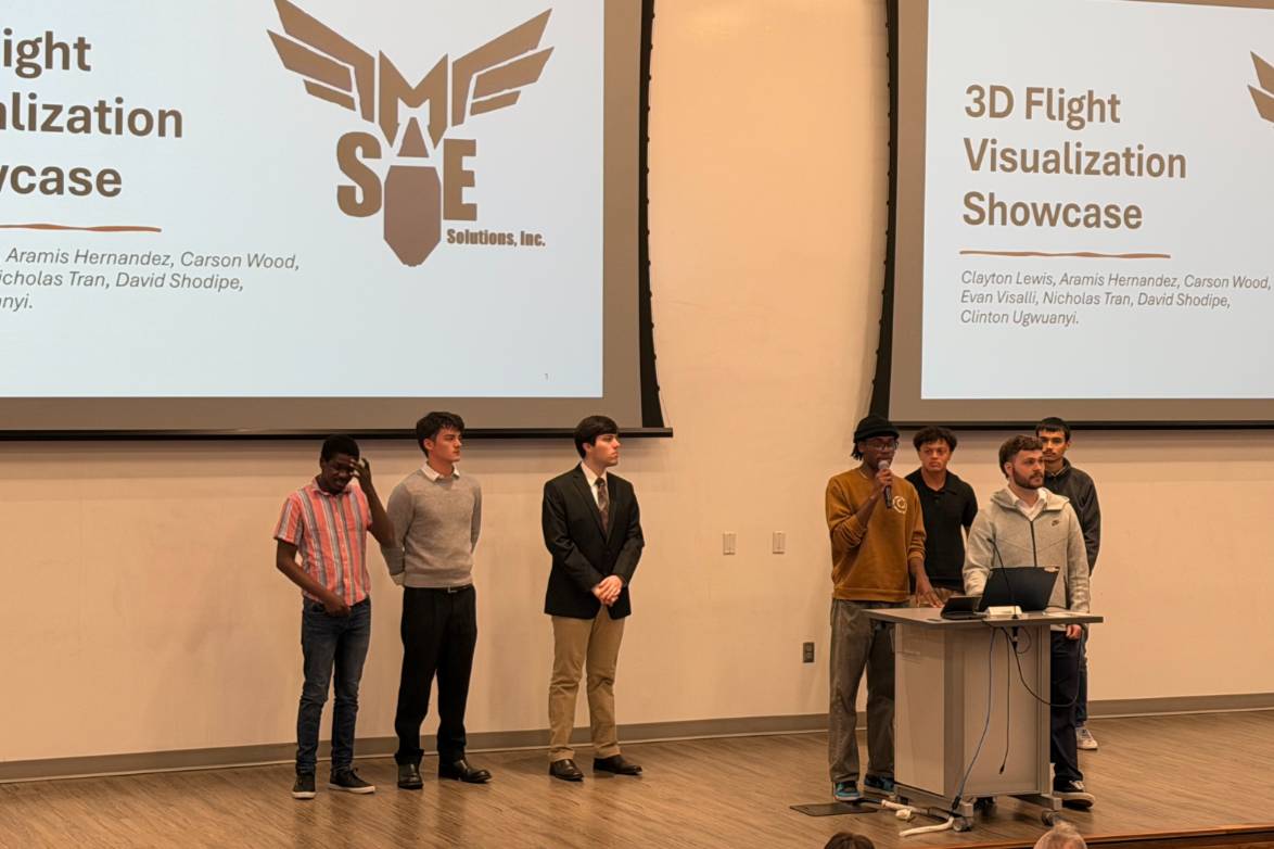 SME Capstone showcase Students on stage presenting