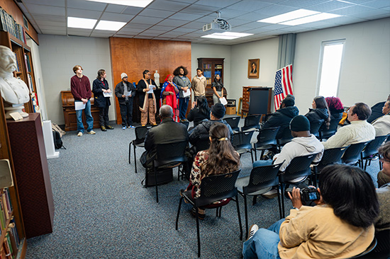 Candid photo from the Frederick Douglass day event. Wide shot of room at freerick douglass event.