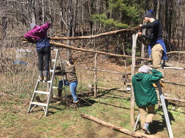 Students building structure