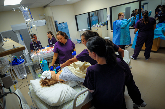 Nursing Students practicing hnads on skils